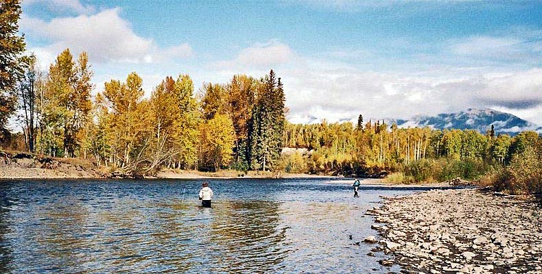 Two friends fly fishing on the Kispiox