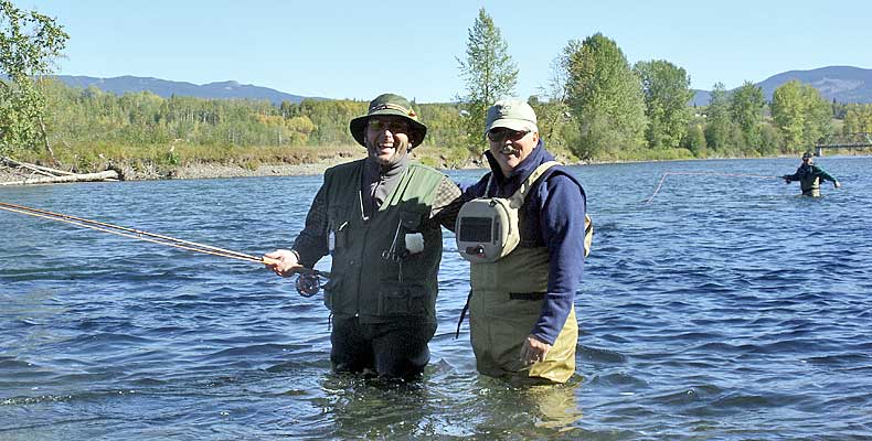Friends fly fish together on the Bulkley River