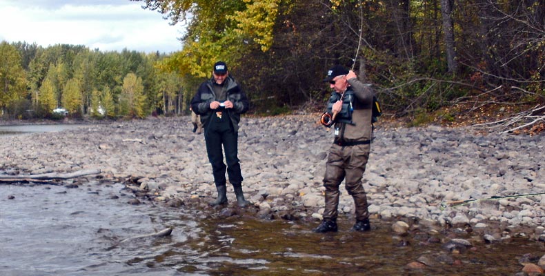 Wolfgang Fabisch landed the Steelhead at the Bulkley